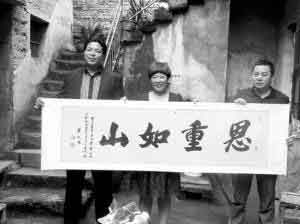 浙江女子21年前帮助小乞丐 而今获赠百万支票(图)