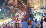江西资溪鹤城花园娱乐设施转盘倒塌，座椅凌乱悬垂钢架变形损毁严重，目击者称现场有孩子哭喊声